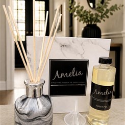 Amelia glass diffuser filled with the scent of sweetpea